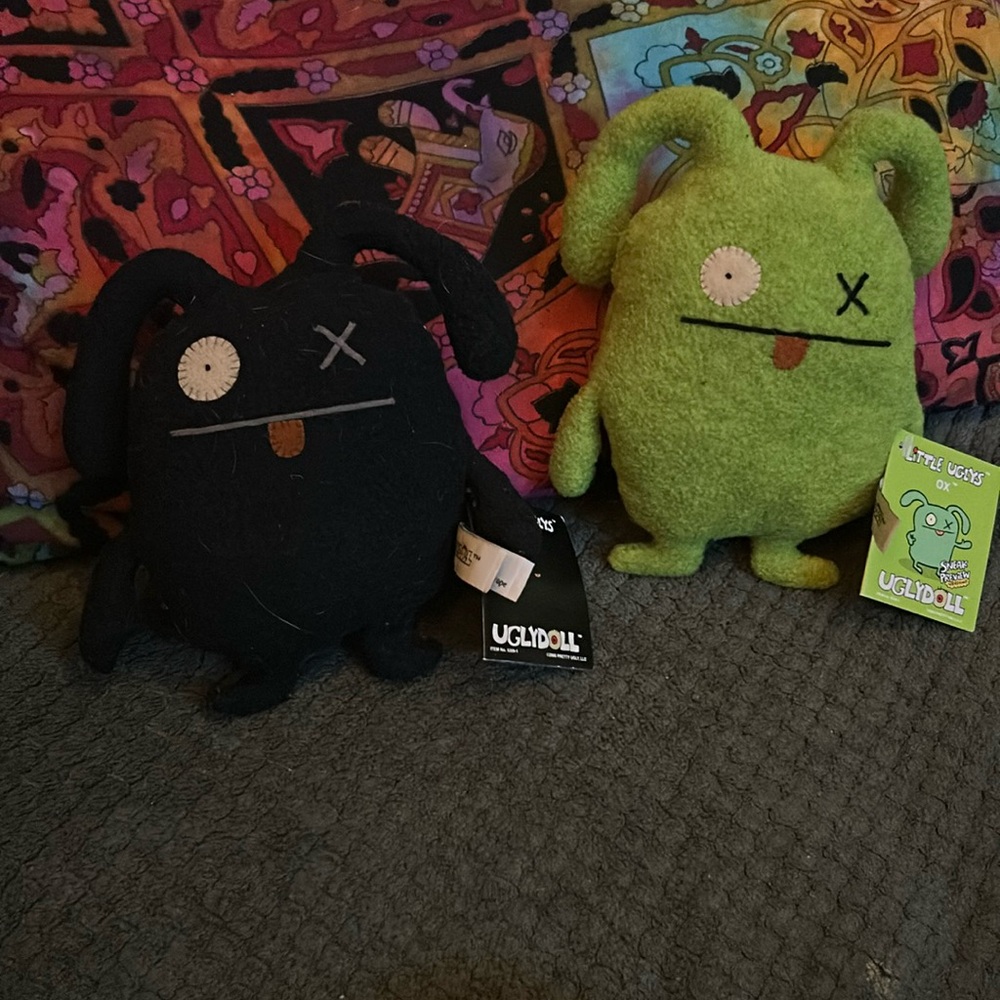 2 little uglys both ox one green and one black